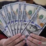 rupiah-dibuka-melemah-terhadap-dolar-as-2623317.jpg